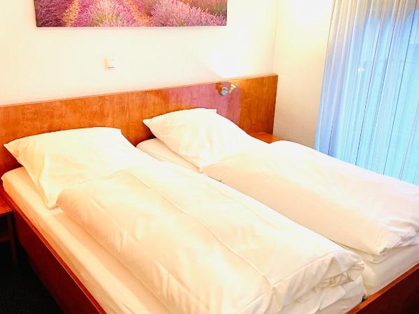 Hotel Garni Merkenich : photo 1 de la chambre chambre deluxe double ou lits jumeaux