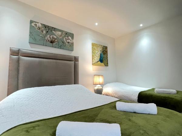Fulham suites : photo 3 de la chambre chambre quadruple Économique avec salle de bains commune