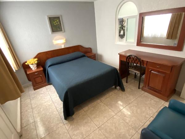 Hotel Qualitel Plus : photo 1 de la chambre chambre lit queen-size