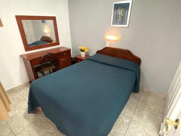 Hotel Qualitel Plus : photo 8 de la chambre chambre lit queen-size