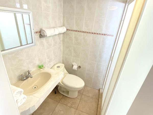 Hotel Qualitel Plus : photo 2 de la chambre chambre avec 2 lits doubles