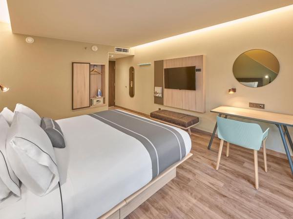 City Express Plus by Marriott Mazatlan : photo 2 de la chambre chambre lit king-size