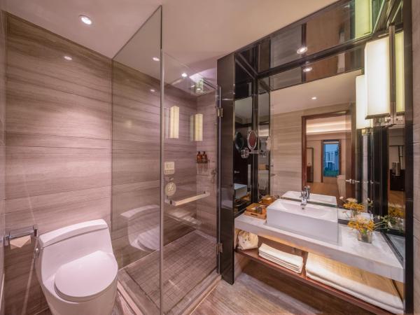 Xunguang Hotel - Chongqing Liangjiang Happiness Plaza : photo 6 de la chambre chambre standard lit queen-size