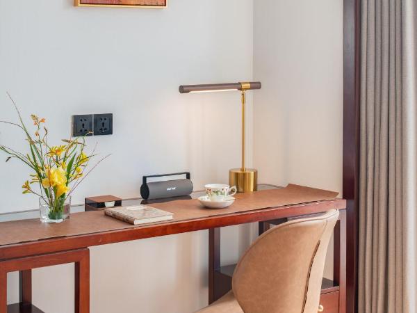 Xunguang Hotel - Chongqing Liangjiang Happiness Plaza : photo 3 de la chambre chambre lits jumeaux deluxe