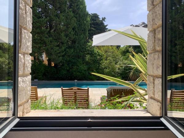 HPC Suites - Parking Gratuit & Piscine Chauffée : photo 7 de la chambre appartement 1 chambre