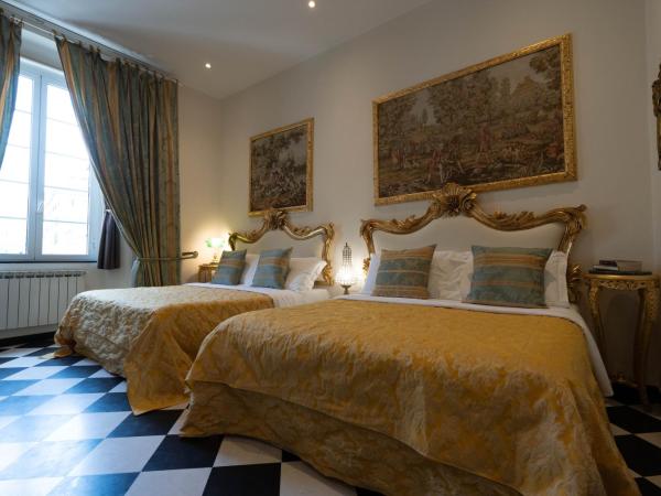 San Giorgio Rooms : photo 7 de la chambre chambre quadruple