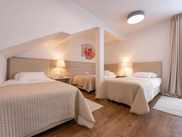 Hotel Magdalena : photo 5 de la chambre chambre triple