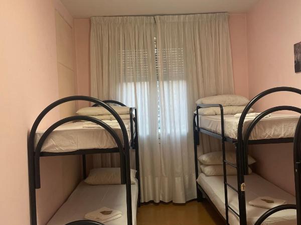 paolohome : photo 1 de la chambre chambre quadruple Économique avec salle de bains commune