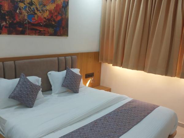 HOTEL R K VILLA : photo 1 de la chambre chambre double deluxe