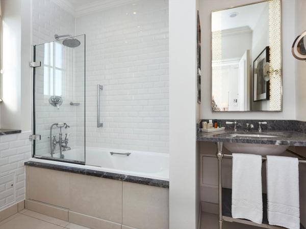 The Waldorf Hilton : photo 1 de la chambre chambre lit queen-size