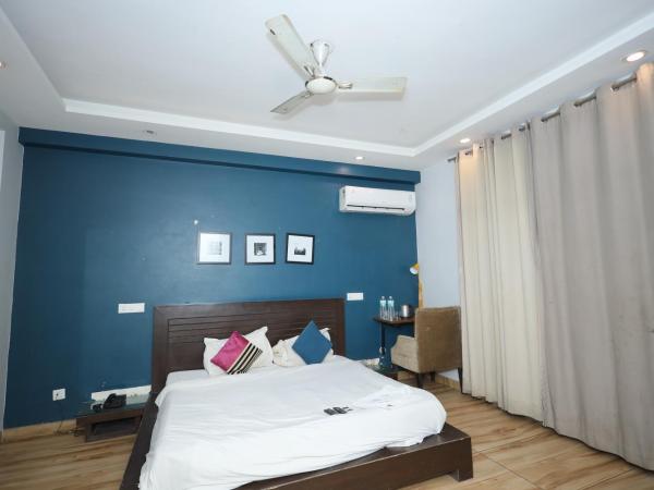 Hotel Wedlock Near Artemis hospital : photo 5 de la chambre chambre double avec salle de bains privative