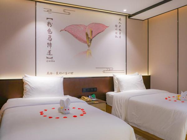 Guangdong Baiyun City Hotel : photo 4 de la chambre chambre lits jumeaux deluxe