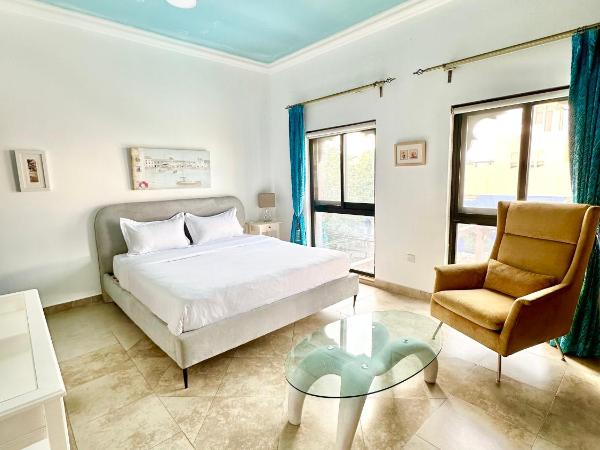 DARÏ : photo 1 de la chambre chambre lit queen-size - vue sur piscine