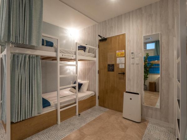Glamping Tokyo Asakusa : photo 7 de la chambre lits superposés dans dortoir mixte avec salle d'eau commune