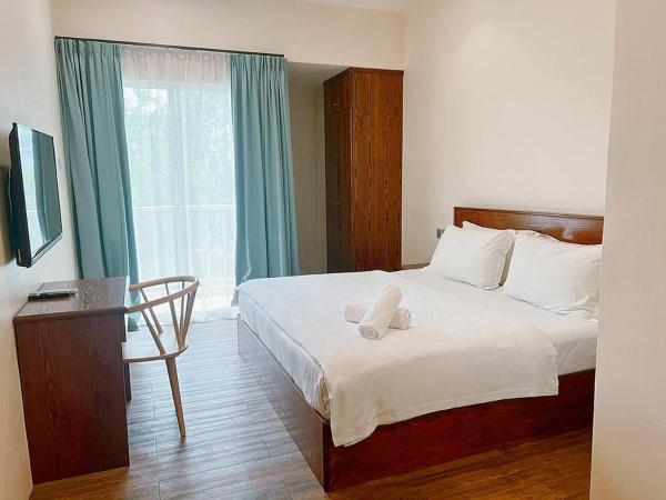 Hako Hotel Taman U : photo 4 de la chambre dual king window