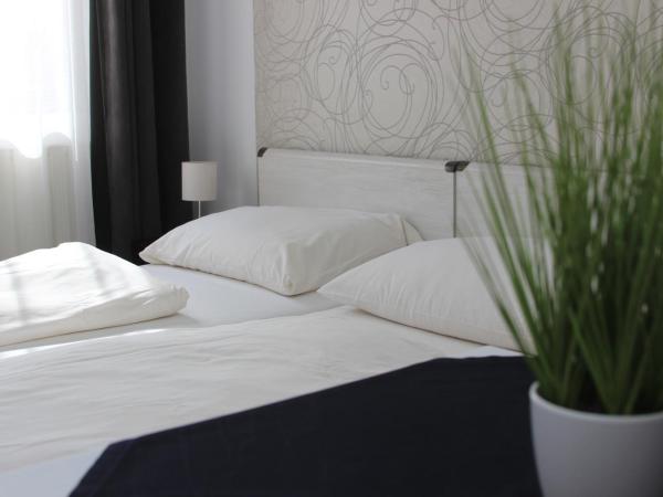 Eden Panzió : photo 2 de la chambre chambre quadruple