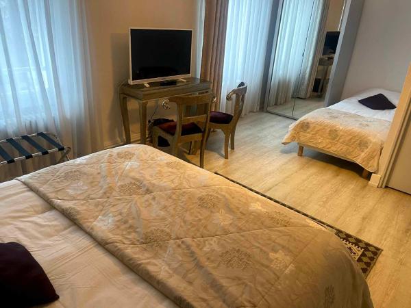 Hôtel La Réserve : photo 4 de la chambre chambre triple