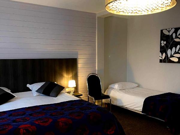 Hôtel La Réserve : photo 5 de la chambre chambre triple