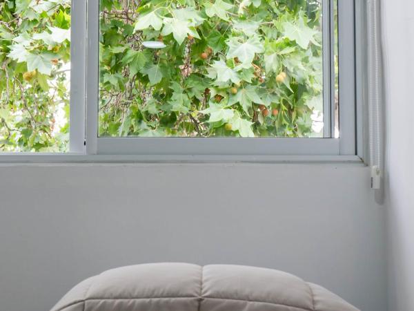 Hostel Casa Roble : photo 1 de la chambre chambre deluxe avec 2 lits queen-size