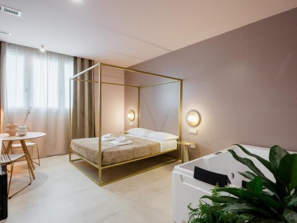 Porta D'Oro Charming House II & Spa : photo 1 de la chambre suite deluxe avec baignoire spa