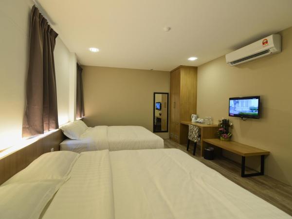 De Parkview Hotel : photo 1 de la chambre twin king size bed room