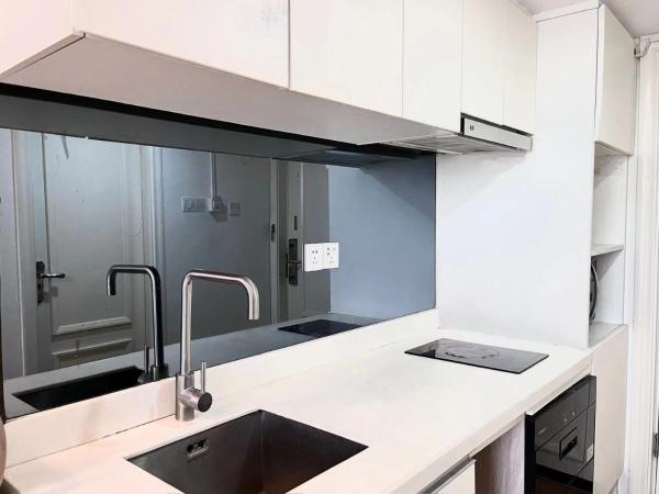 广州沃家国际公寓 : photo 7 de la chambre chambre double ou lits jumeaux deluxe - vue sur ville 