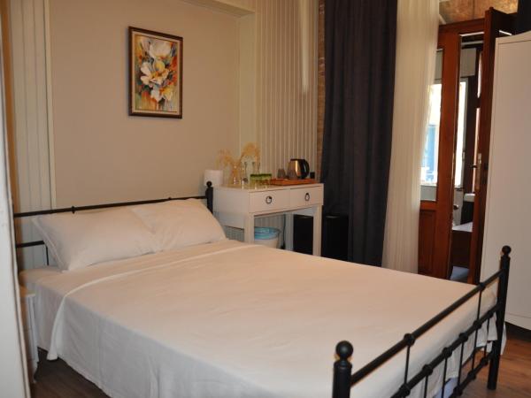 La Casa Carina Butik Otel : photo 5 de la chambre chambre double deluxe (2 adultes + 1 enfant)