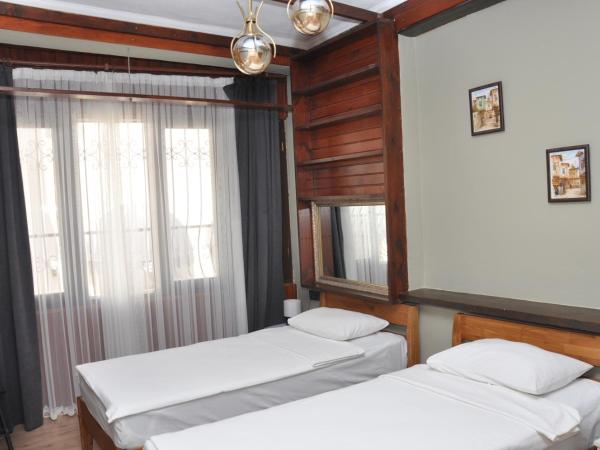 La Casa Carina Butik Otel : photo 7 de la chambre chambre double deluxe (2 adultes + 1 enfant)