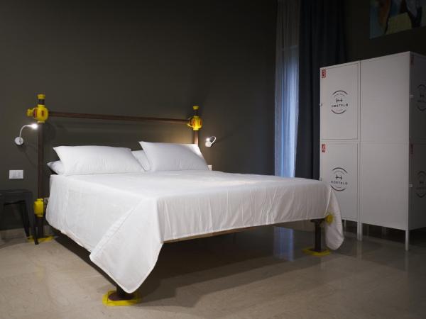 Hostelò - Luxury Hostel : photo 2 de la chambre dortoir mixte de 8 lits 