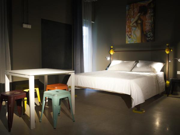 Hostelò - Luxury Hostel : photo 3 de la chambre chambre quadruple avec terrasse 