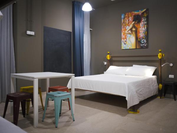 Hostelò - Luxury Hostel : photo 1 de la chambre chambre quadruple avec terrasse 