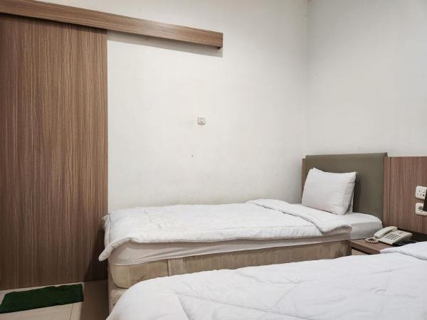 Joker Hotel & Residence : photo 2 de la chambre chambre lits jumeaux deluxe