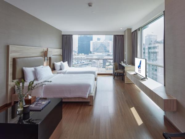 Adelphi Suites Bangkok - SHA Extra Plus : photo 1 de la chambre chambre studio lits jumeaux