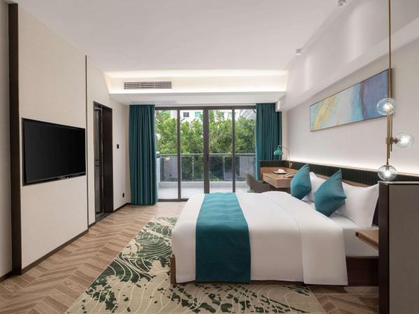 Days Inn by Wyndham Hainan Sanya Bay : photo 1 de la chambre deluxe sunshine king room - non-smoking