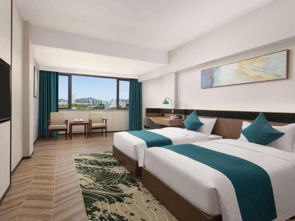 Days Inn by Wyndham Hainan Sanya Bay : photo 1 de la chambre chambre lits jumeaux familiale - non-fumeurs
