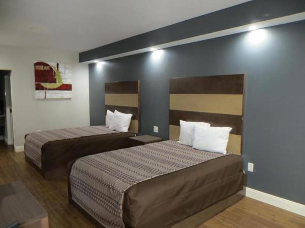 Grand Villa Inn and Suites Westchase/Chinatown : photo 7 de la chambre chambre double deluxe