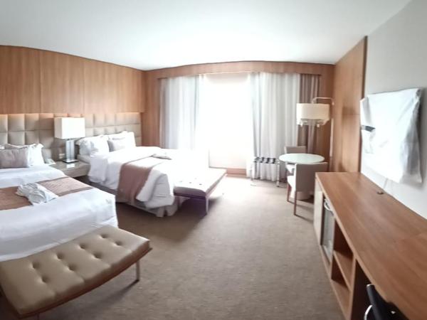 White Plaza Hotel : photo 1 de la chambre chambre deluxe avec 2 lits doubles