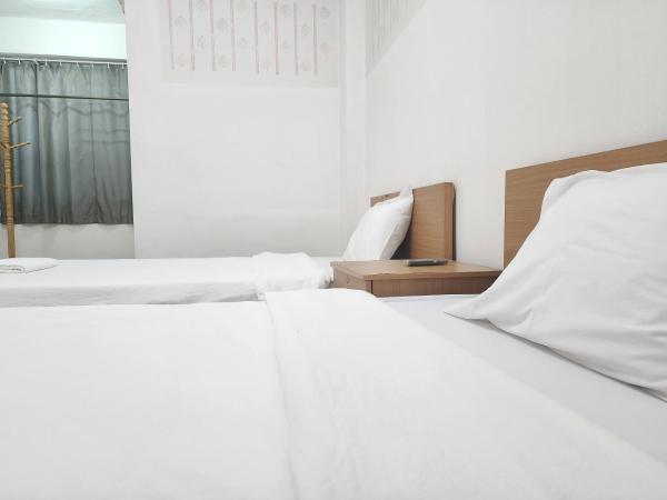 Green Apartment Kaset : photo 5 de la chambre chambre lits jumeaux standard