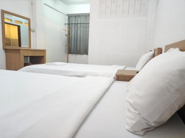 Green Apartment Kaset : photo 7 de la chambre chambre lits jumeaux standard