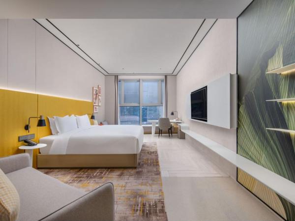 Hilton Garden Inn Nanjing Hexi Olympic Sports Center : photo 5 de la chambre chambre lit king-size premium avec canapé-lit