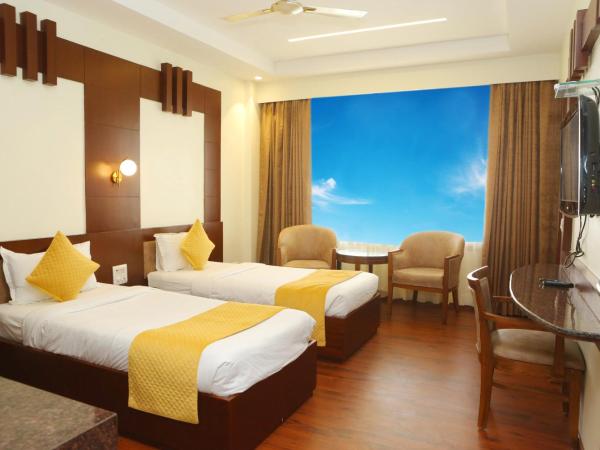 Karon Hotels - Lajpat Nagar : photo 3 de la chambre chambre deluxe double ou lits jumeaux