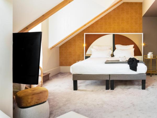 Le Saint Gervais Hotel & Spa Handwritten Collection : photo 8 de la chambre chambre double supérieure avec canapé