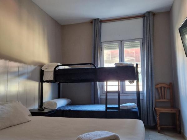 Metropolitan Atocha : photo 4 de la chambre chambre quadruple avec salle de bains privative