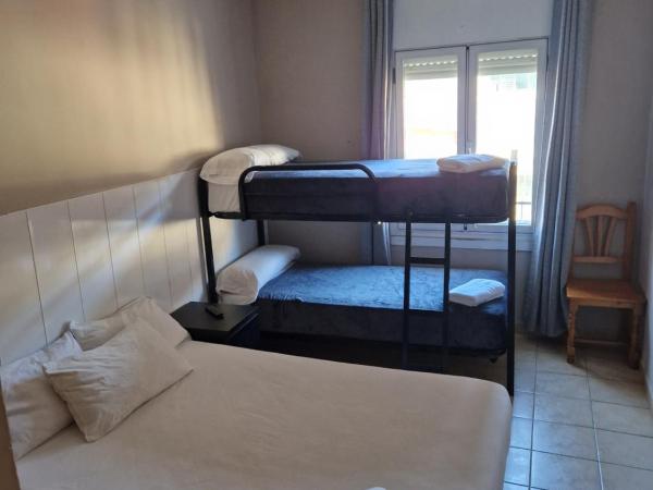 Metropolitan Atocha : photo 3 de la chambre chambre quadruple avec salle de bains privative