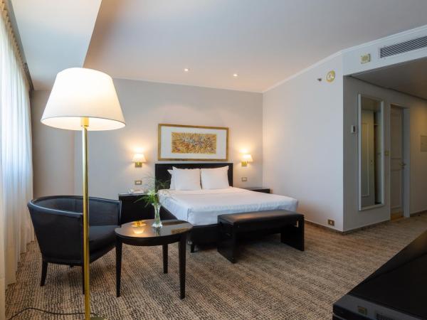 Quinto Centenario Hotel : photo 1 de la chambre chambre lit queen-size classique – vue sur ville