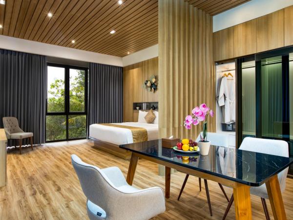 Kinaralana Hotel Yogyakarta : photo 1 de la chambre suite lit queen-size