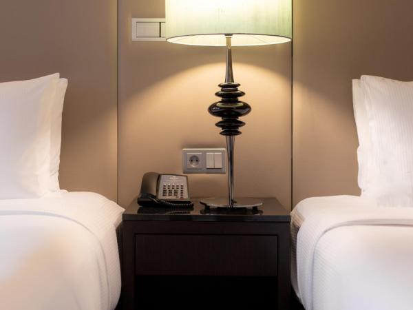 Hilton Berlin : photo 4 de la chambre chambre lits jumeaux