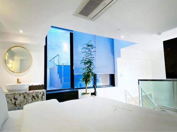Garden Pool Villa Lee Chung Jung : photo 9 de la chambre suite - vue sur ville