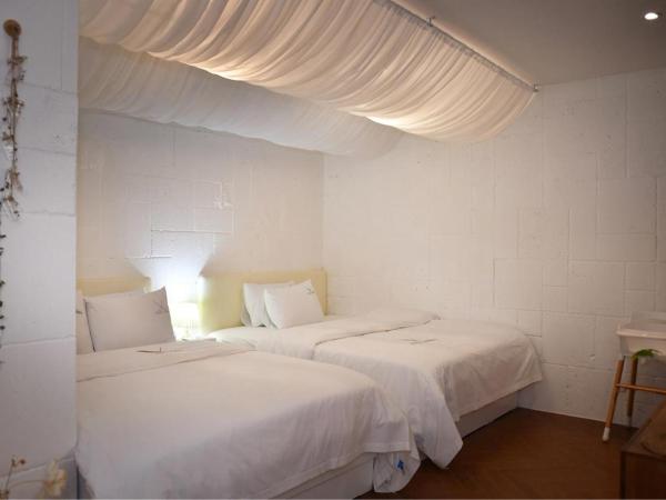 Garden Pool Villa Lee Chung Jung : photo 7 de la chambre suite - vue sur ville
