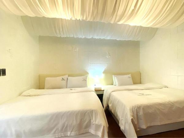 Garden Pool Villa Lee Chung Jung : photo 6 de la chambre suite - vue sur ville
